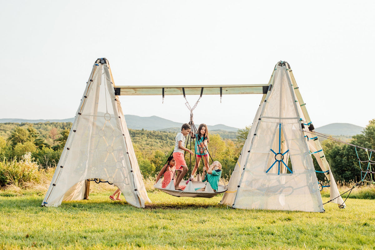 Child climbing on a Bijou Build play structure